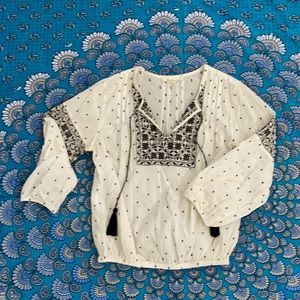 White embroidered “bohemian” blouse